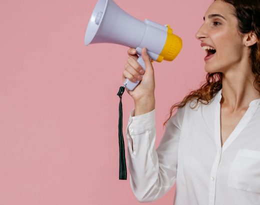 woman speaking on a megaphone